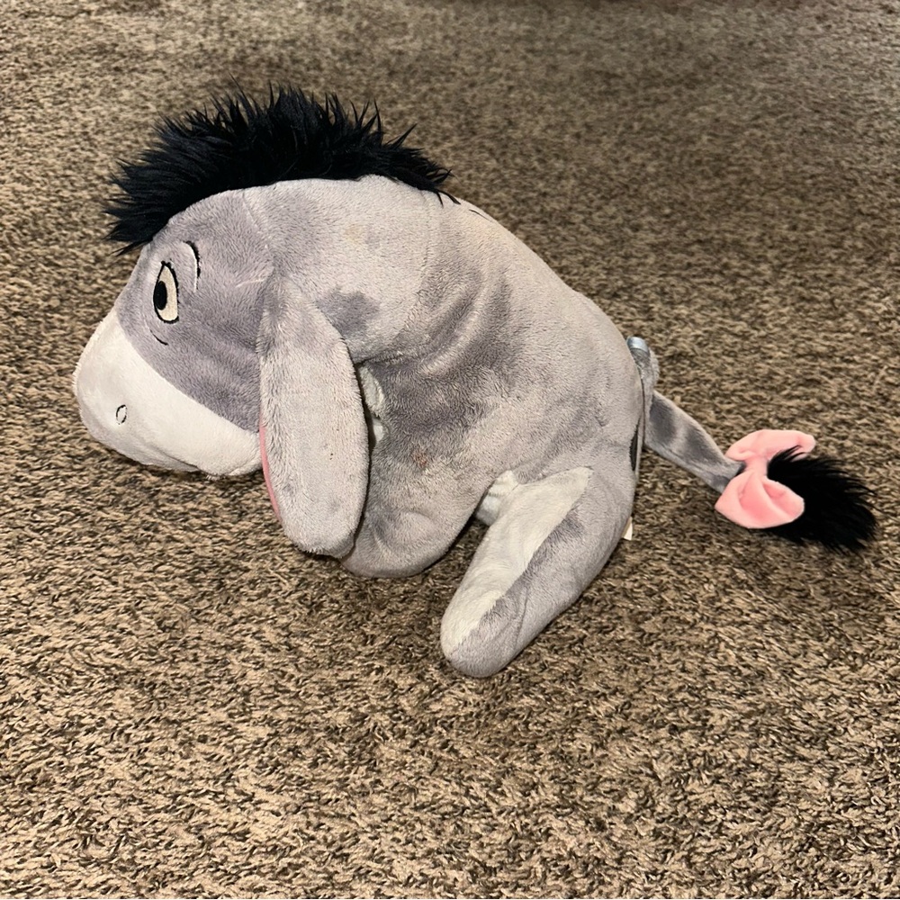 The Disney store Eeyore with detachable stuffed animal